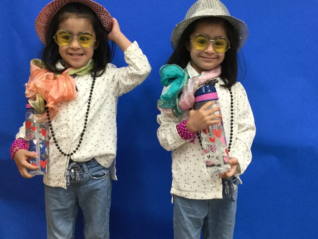 twins dressed up as pop stars