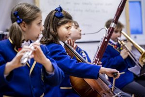 children in a music lesson