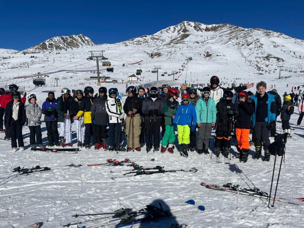 students and teachers on a ski trip