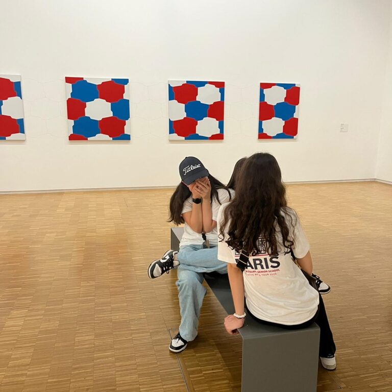 students in an art gallery