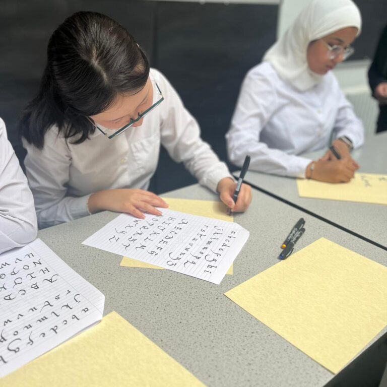 students practicing handwriting